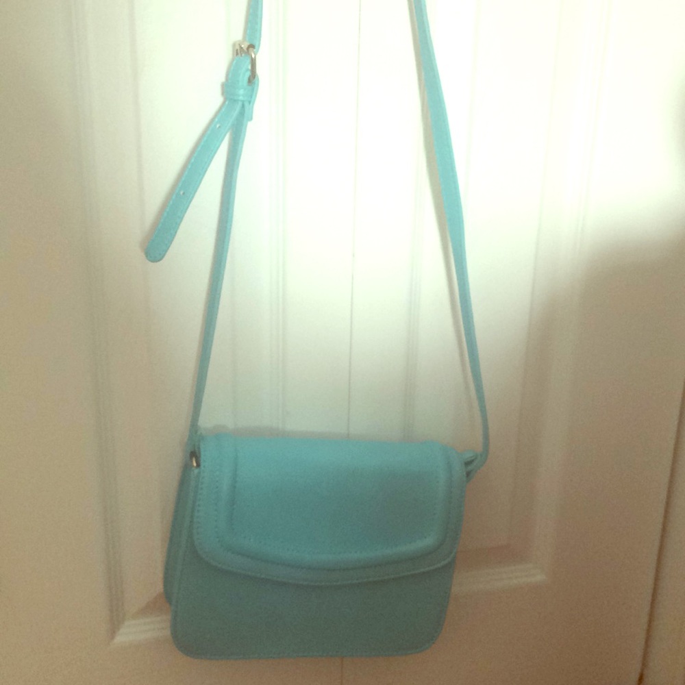 Charming Charlie crossbody blue purse. Like new.